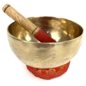 15cm Himalayan singing bowl with wooden striker on cushion